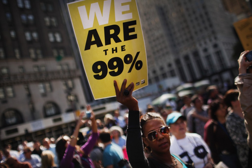 Occupy Wall Street Protestors March Down New York's Fifth Avenue