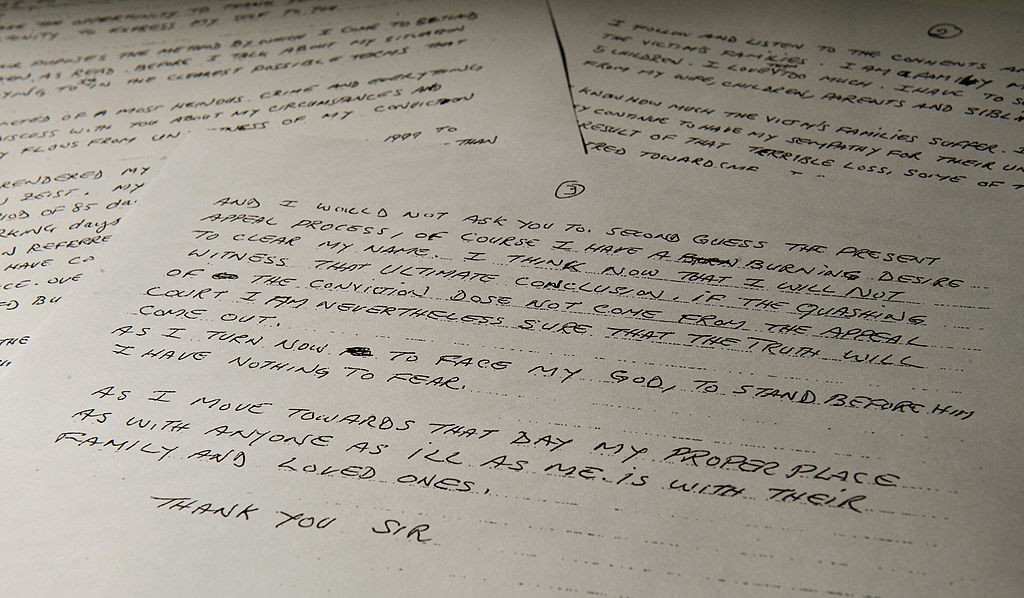 A print of a hand-written note by convic